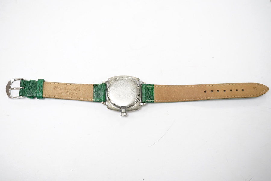 A gentleman's 1930's stainless steel Oyster Watch Co. manual wind wrist watch, with Arabic dial and subsidiary seconds, case diameter 30mm, on a later associated leather strap. Condition - poor